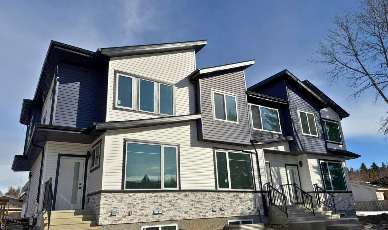 Luxury multi-family apartment building representing CMHC-backed real estate investment opportunities in Calgary and Edmonton.
